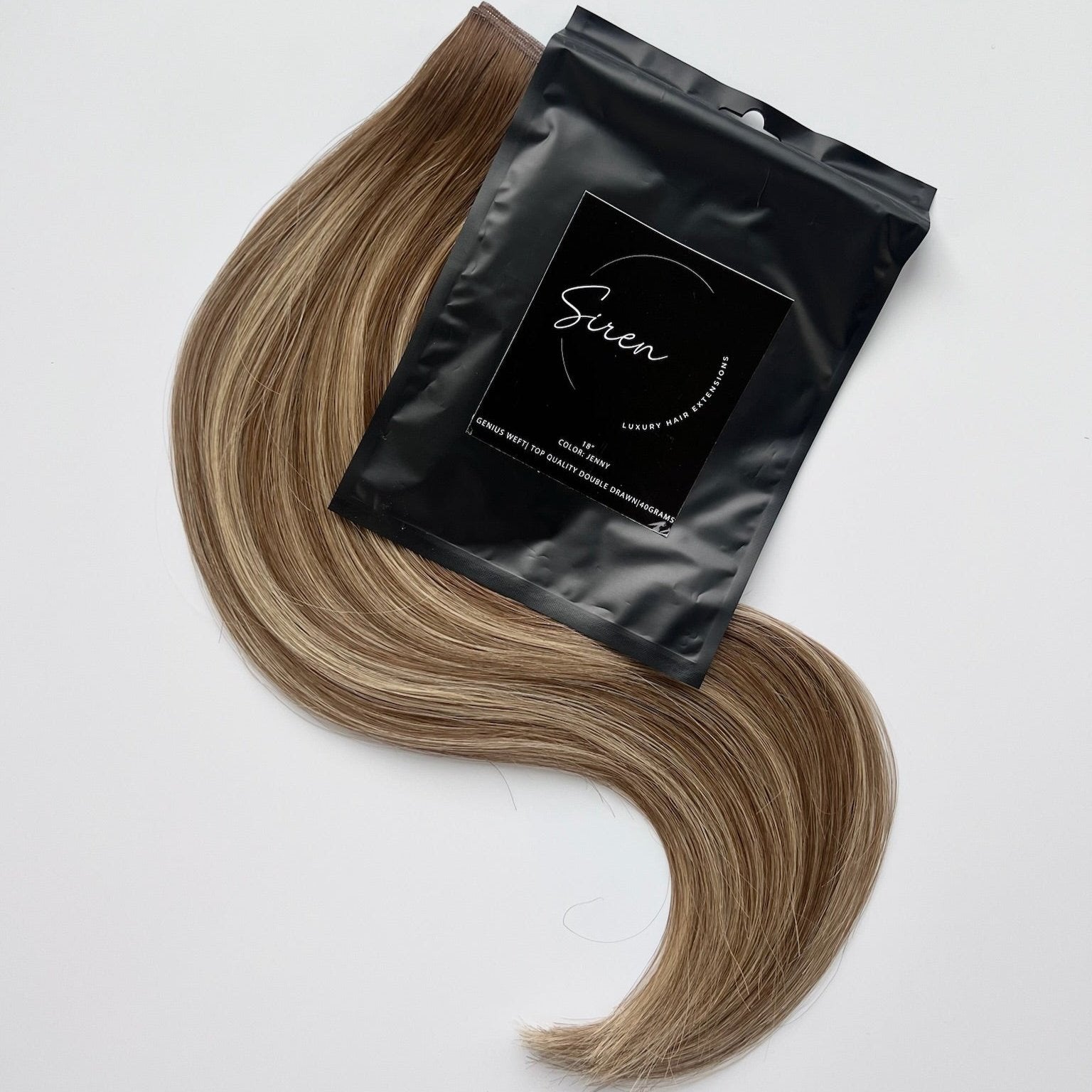 Jenny color Siren Hair Extensions featuring a warm Level 7 base with piano-keyed dimensional ends, including warm Level 7 lowlights and Level 10 warmer blonde highlights. Ideal for natural blondes seeking a lived-in, dimensional look.