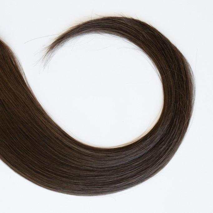 Anna color Siren Hair Extensions featuring a neutral Level 6 brunette shade, showcasing premium Remy Human Hair with a natural, root-to-end even tone. Ideal for creating darker brunette styles.