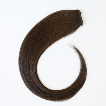 Anna color Siren Hair Extensions featuring a neutral Level 6 brunette shade, showcasing premium Remy Human Hair with a natural, root-to-end even tone. Ideal for creating darker brunette styles.