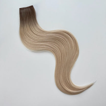 Misty color Siren Hair Extensions featuring a neutral/cool Level 9 base with solid neutral Level 10 ends, offering a sleek, dimension-free look. Ideal for achieving platinum blonde or Barbie-hair perfection.