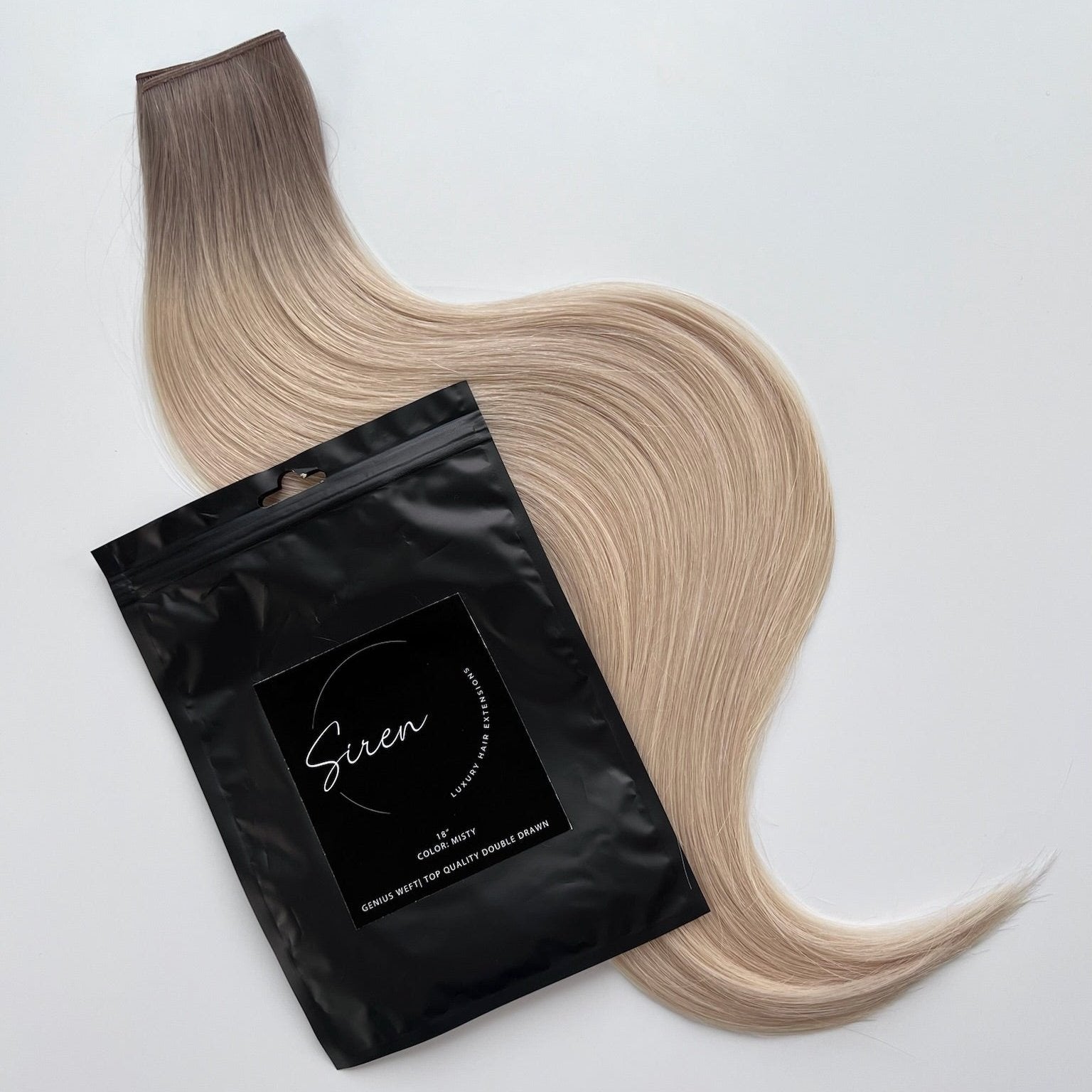 Misty color Siren Hair Extensions featuring a neutral/cool Level 9 base with solid neutral Level 10 ends, offering a sleek, dimension-free look. Ideal for achieving platinum blonde or Barbie-hair perfection.