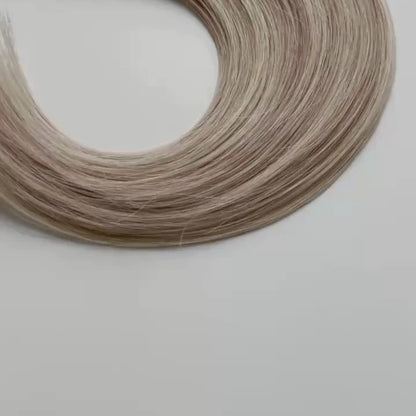 Anne color Siren Hair Extensions featuring a neutral Level 8 base with piano-keyed dimensional blonde ends, including Level 10 neutral and cool/pearl highlights. Perfect for natural blonde styles.